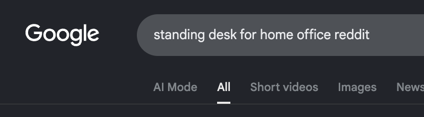 Google search for "standing desk for home office reddit," demonstrating how users search with "Reddit" in their query instead of using the site:reddit.com search operator.