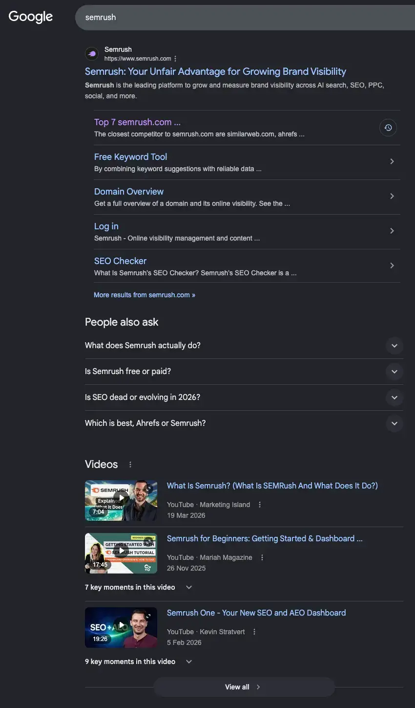 Google search results page for “semrush” with Semrush’s homepage, sitelinks, People also ask, and several YouTube videos ranking below, showing the SEO opportunity for comparison and review videos around competitor brands.