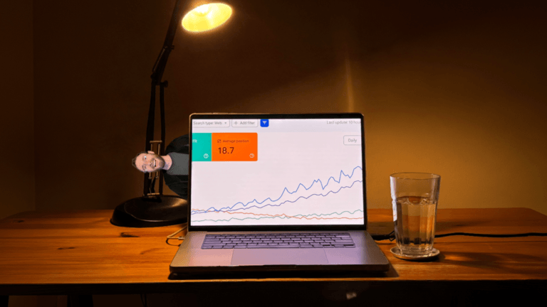 Laptop showing rising Google Search Console rankings, illustrating how to rank faster by using the topical authority your website already has.