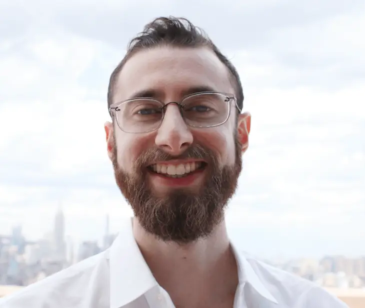 Edward Sturm standing in front of the NYC skyline, prepared to do amazing SEO for his clients.