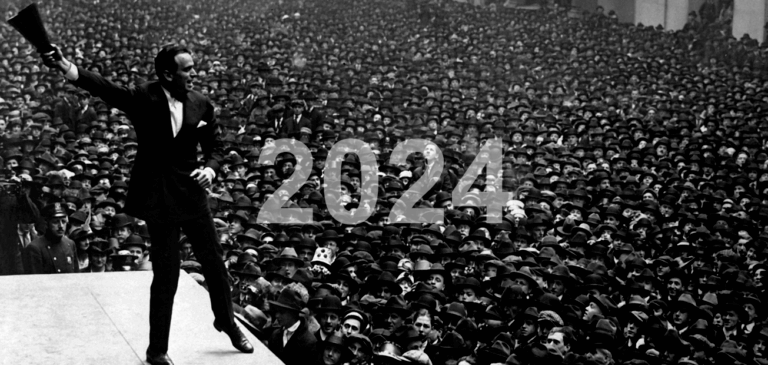 A black and white image of an excited man speaking to an enormous crowd with a text overlay of "2024"