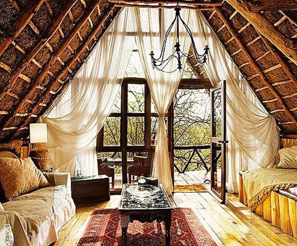 A bohemian interior design for a tree house type Airbnb listing.