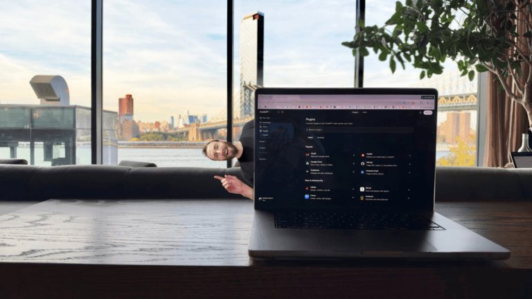 Edward Sturm peeking out from behind a laptop showing the ChatGPT Plugins directory, with a New York City skyline and bridge view behind him, illustrating 3 SEO tactics: images, backlinks, and ChatGPT plugins.