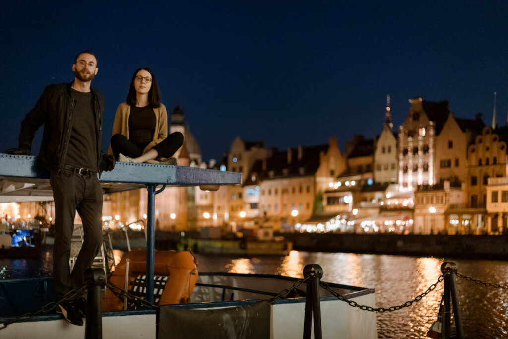 Edward Sturm and Marta Rosa on a boat on the Motława River in Gdańsk, Poland in 2019