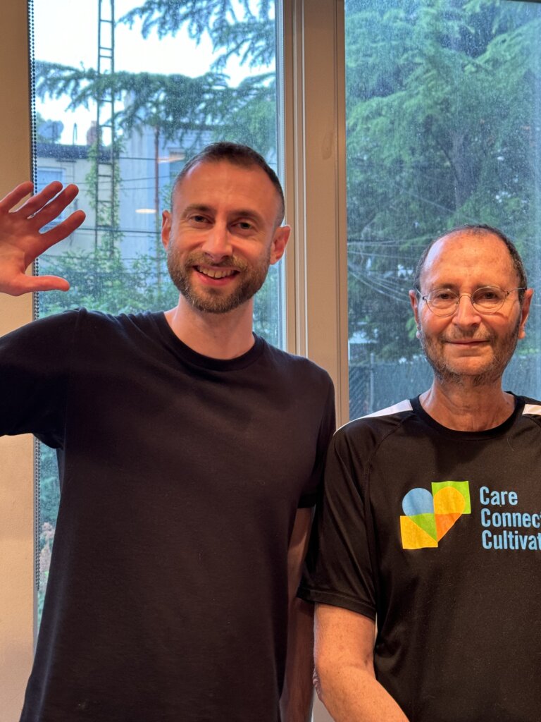 Edward Sturm, smiling, with his father in Brooklyn, NYC in 2024.