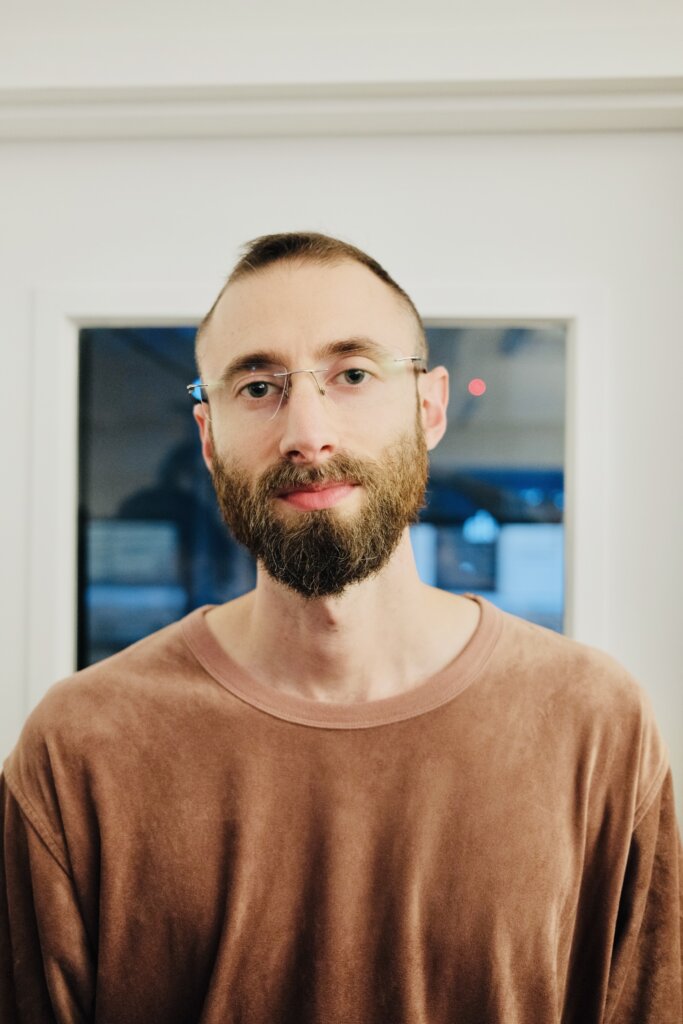 Edward Sturm in a suede t-shirt at a tech event in NYC in 2023.