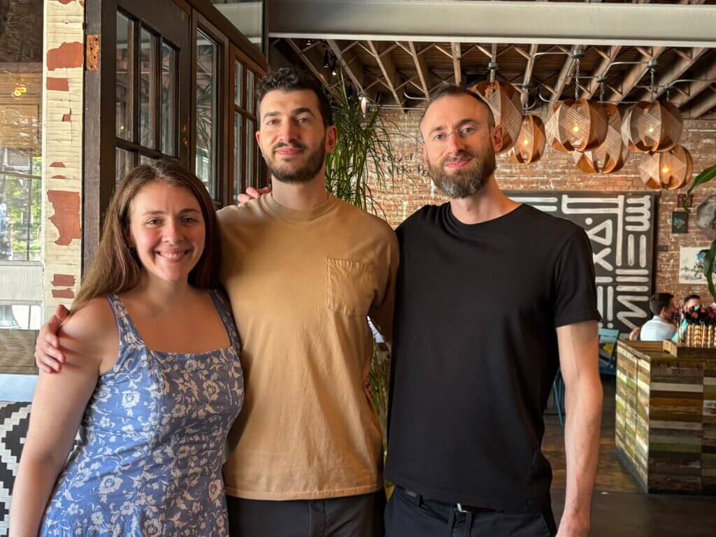 Edward Sturm with his brother and his brother's fiancé at a restaurant in Chicago, 2026.